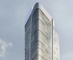 Vista real de la parte superior de la T1 Tower Frankfurt con fachada curva de cristal